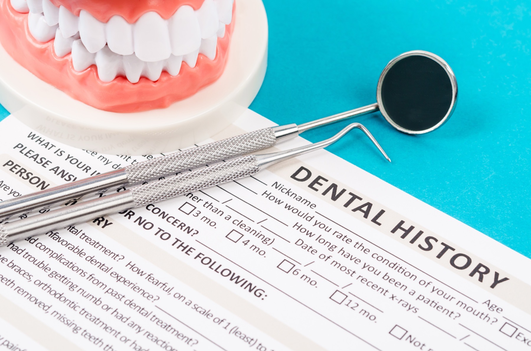 Dental history form and diagnostic equipment at Smile By Design Dental Group in Irvine